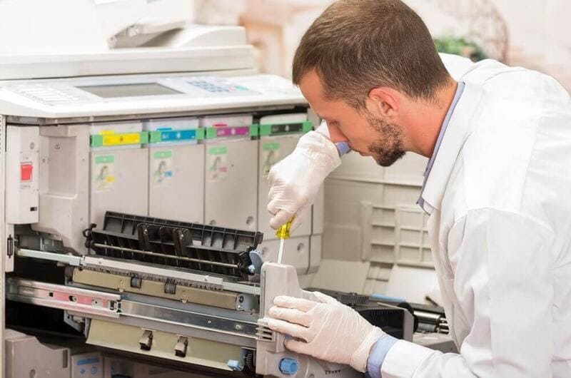 Cách xử lý an toàn khi máy photocopy có mùi khét