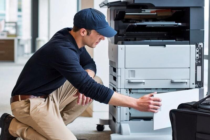 Chi phí sửa máy photocopy có mùi khét và các yếu tố liên quan